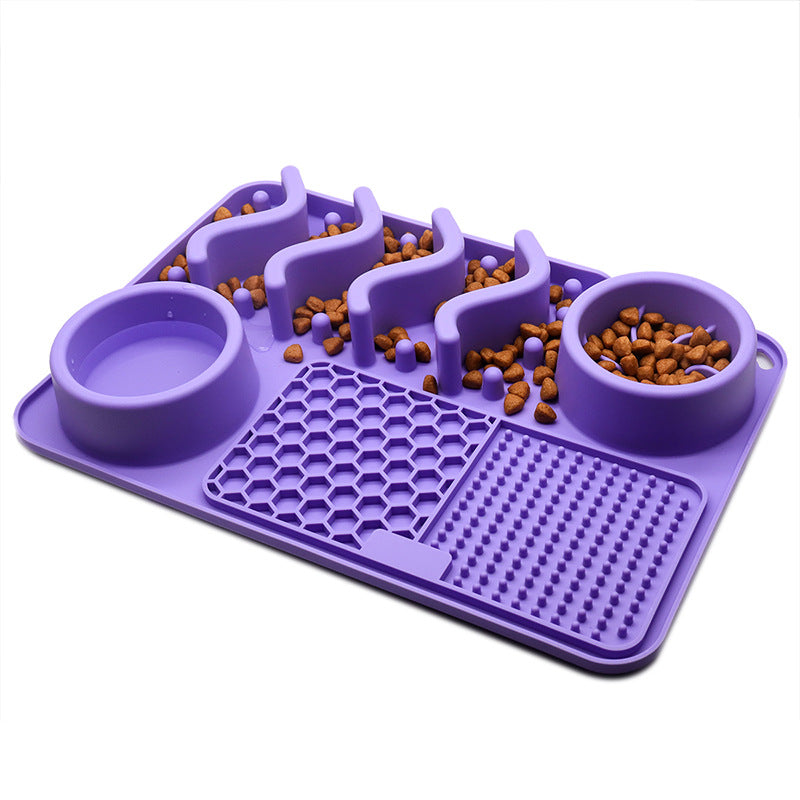 cat enjoying treat on silicone licking pad